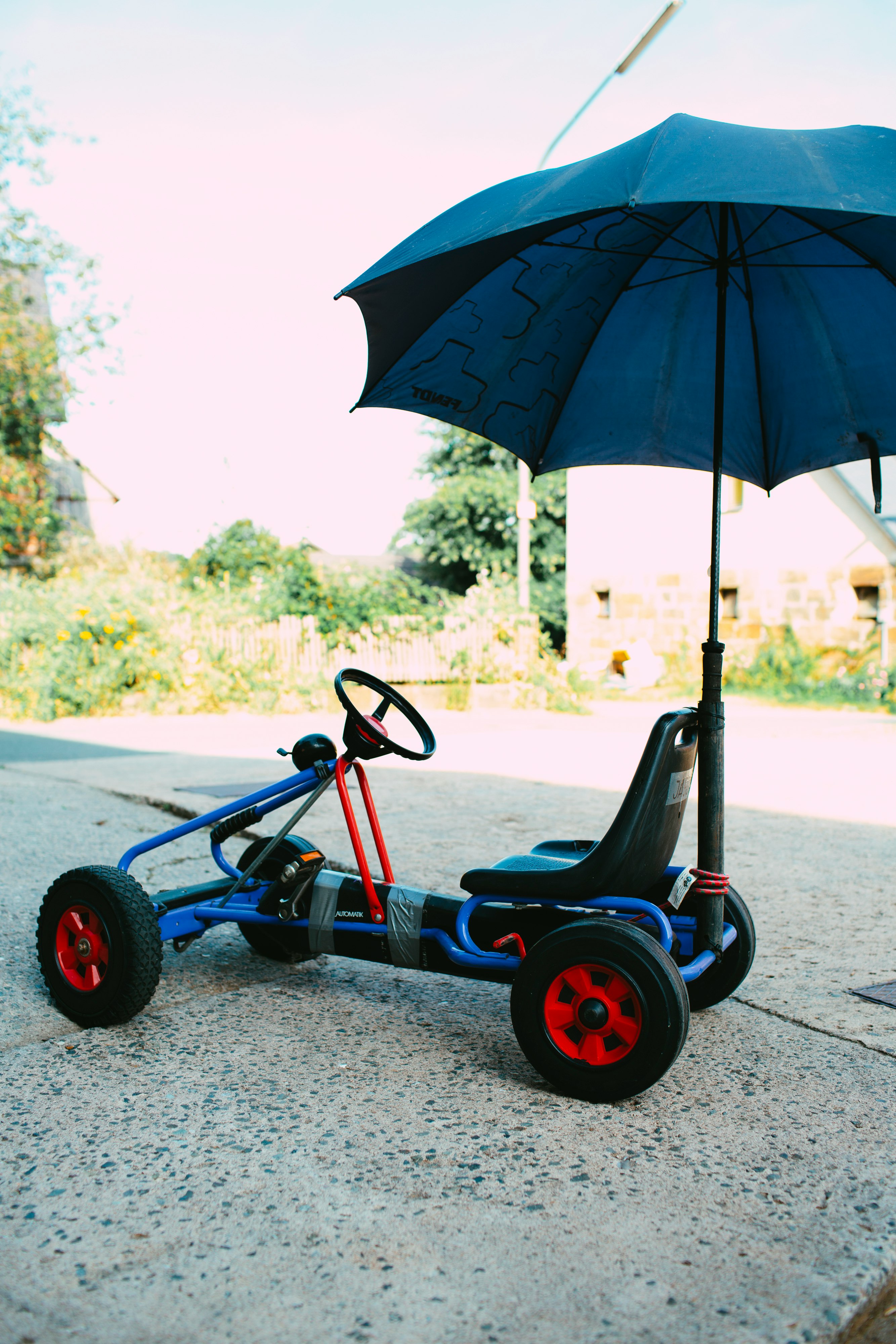 black and red ride on toy car